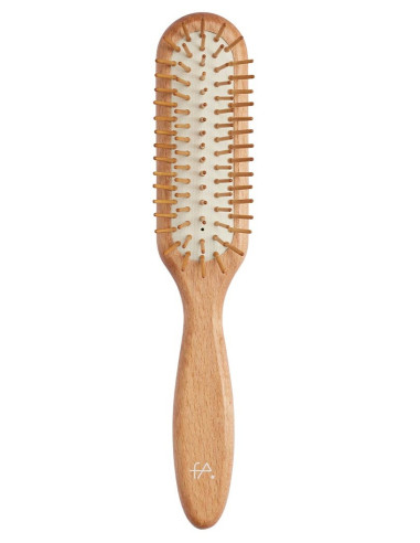 “Hairbrush with a rubber cushion,...