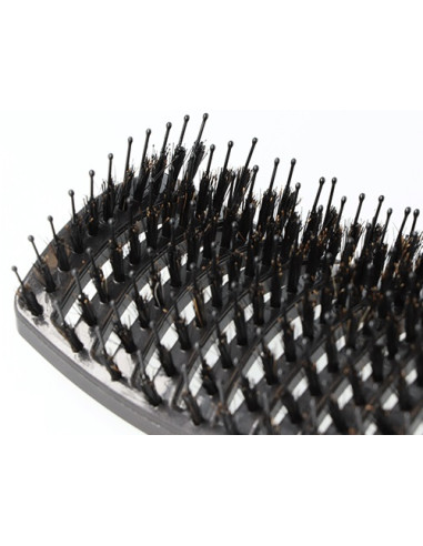 Hairbrush with a curved vented body...